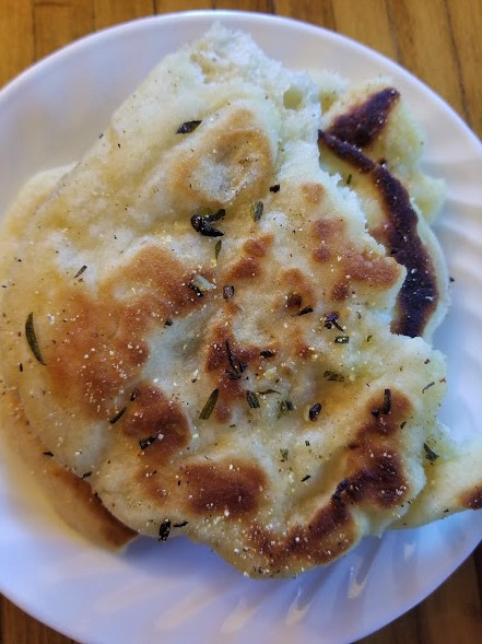 GARLIC AND ROSEMARY BUTTER NAAN