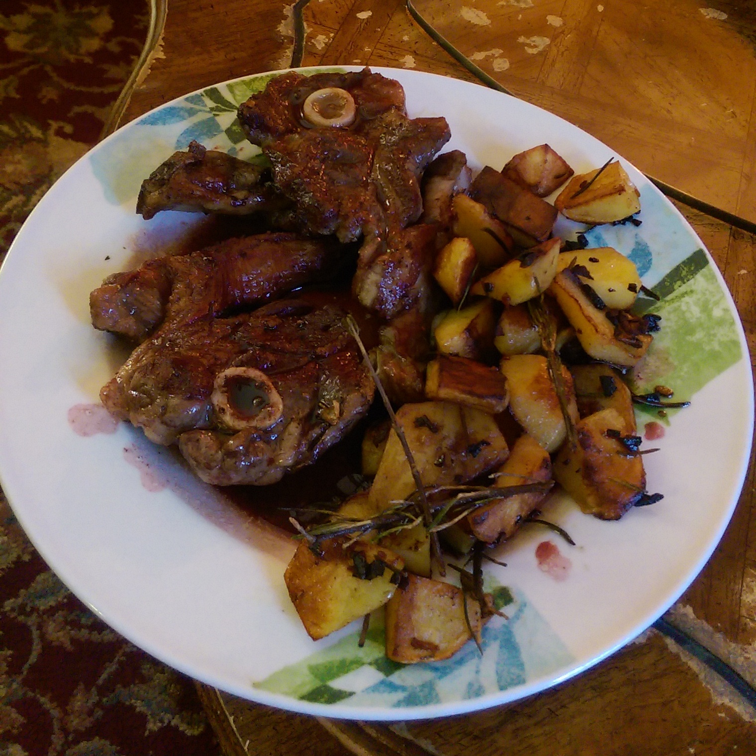 Lamb Chops with a Red Wine and Pomegranate Reduction and Garlic, Butter, Rosemary Potatoes